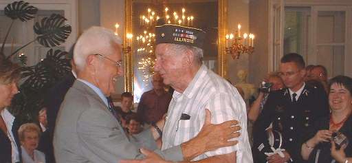 Normandy Safaris WWII Veteran, Al Drogosz, collects his Commemoration Medal at a French ceremony